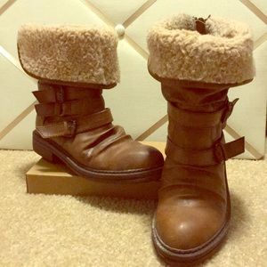 Boots. Brown and tan with buckles.